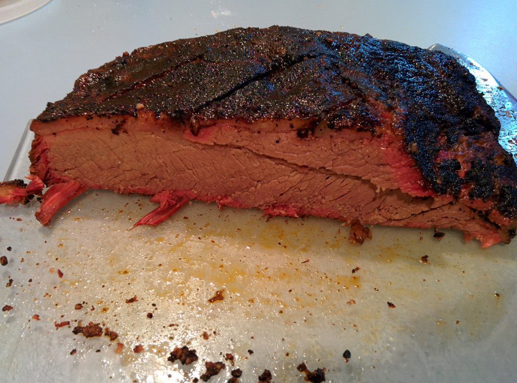 Cut through the brisket -- check out the beautiful smoke ring!